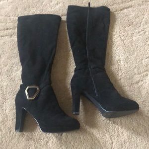 Black heel boots with gold buckle